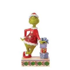 Disney Figur Grinch læner sig op af gaver